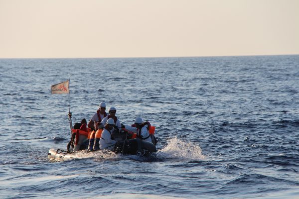 Rescuing the first people and bringing them safely back on board of Dignity I